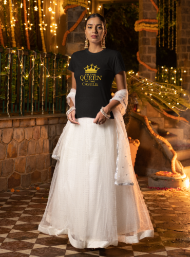 gildan-tee-mockup-of-a-woman-standing-in-a-diwali-decorated-garden-m36015