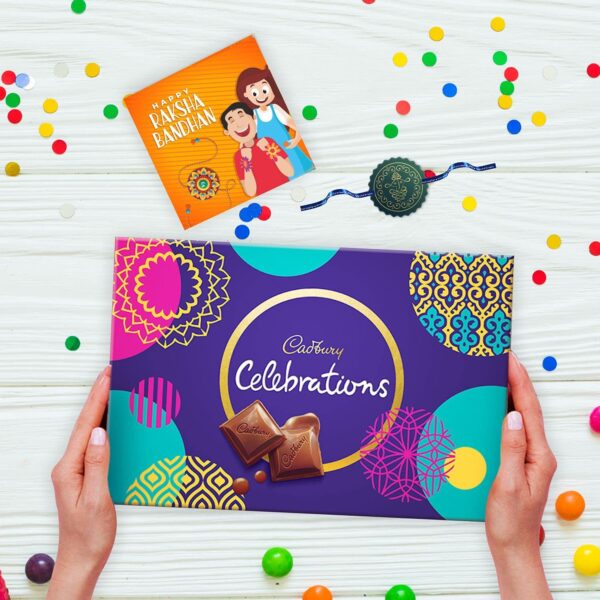 YaYa cafe Assorted Chocolate Cadbury Celebrations (186.6 g) with Ganesha Printed Rakhi Gift Combo (Beige)