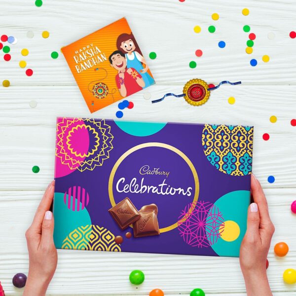 YaYa cafe Assorted Chocolate Cadbury Celebrations (186.6 g) with Ganesha Printed Rakhi Gift Combo (Beige)