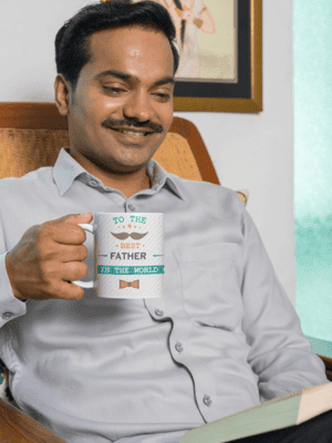 coffee-mug-mockup-featuring-a-man-reading-a-book-at-home-m29669-3-1