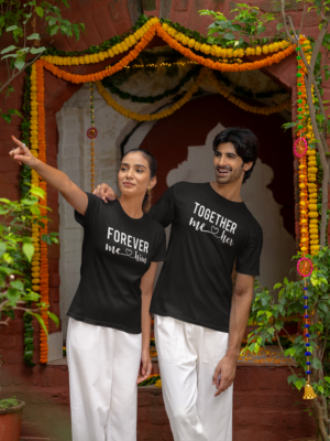 gildan-t-shirt-mockup-featuring-a-woman-and-a-man-pointing-at-something-in-a-diwali-celebration-m36004